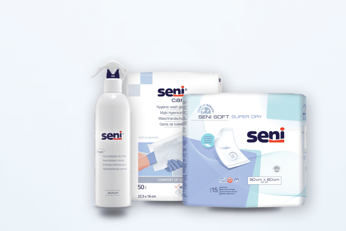 Hygiene- und Bettschutzprodukte auf hellblauer Bühne